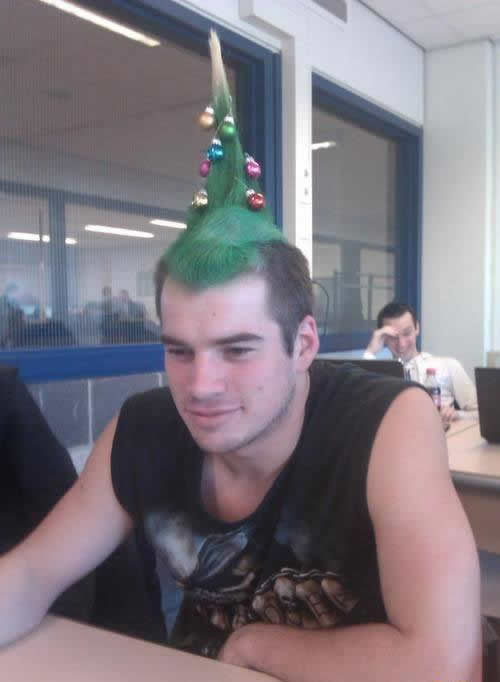 Photo of a boy who built his Christmas tree with his hair and was also well decorated for the holiday