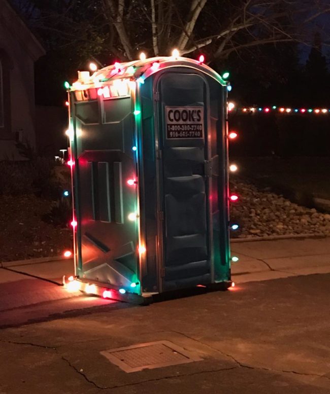 A chemical bath for the yard decorated with colored Christmas lights, it's Christmas for everyone